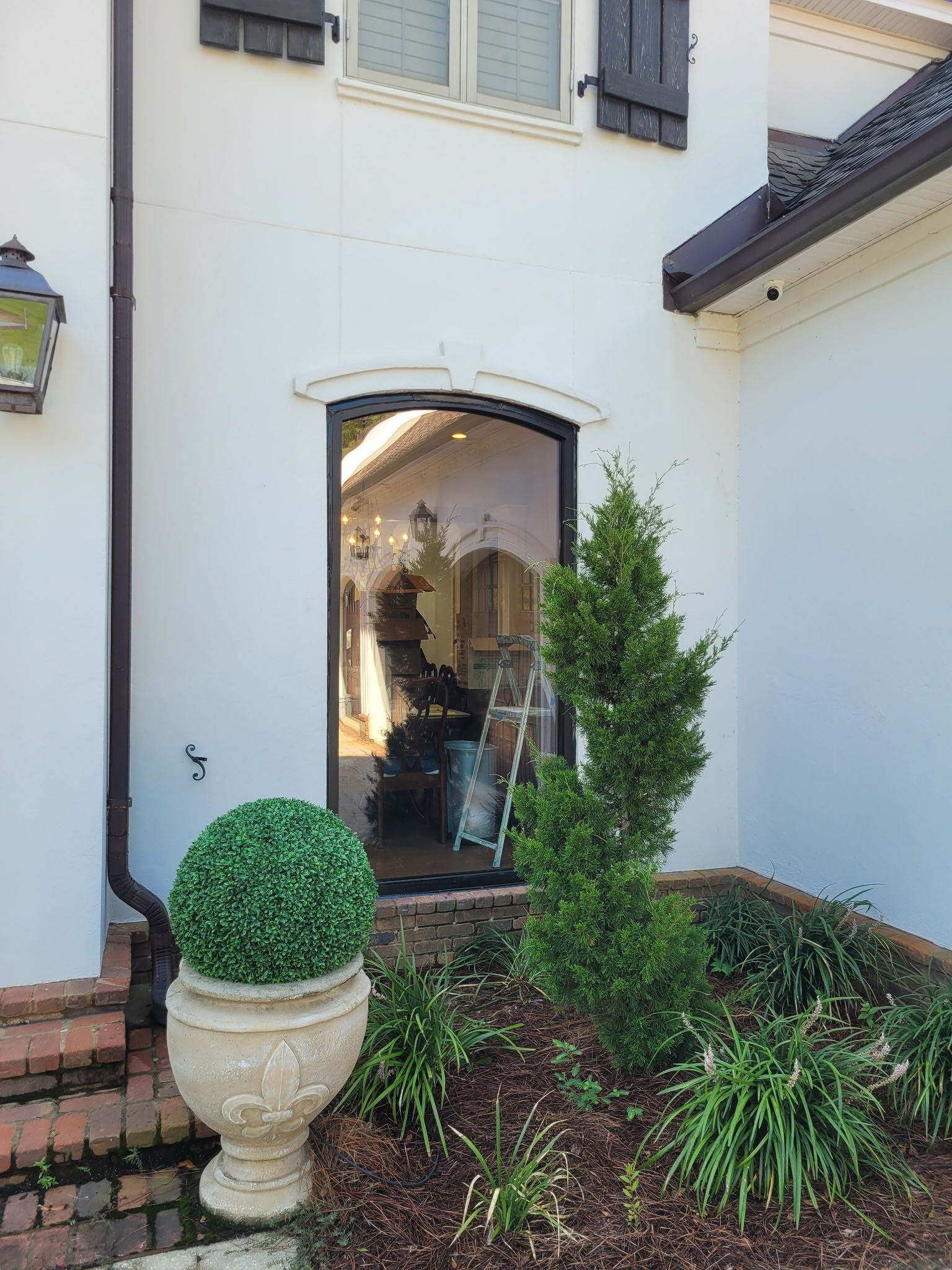 Custom arched mirror installed in a home entryway in Baldwin County, AL